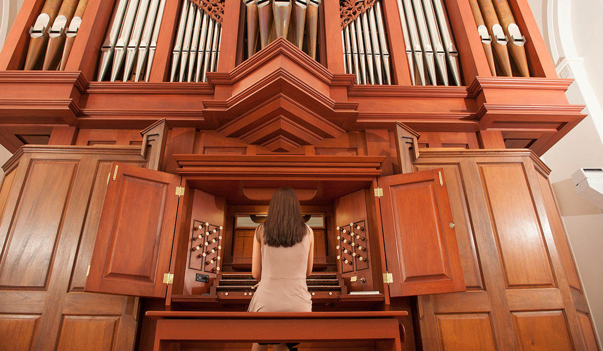 Woman playing organ