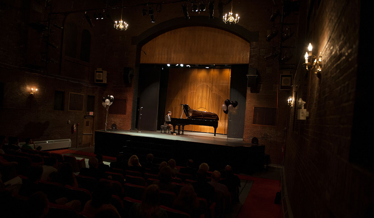 Student playing piano